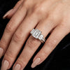 Elegant Three-Stone Emerald Cut Diamond Ring with Pavé Band in Two-Tone Gold
