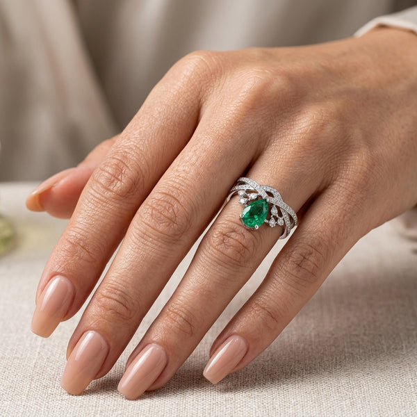 Pear-Cut Emerald Elegance Ring with Moissanite Accents in Silver