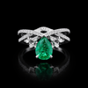 Pear-Cut Emerald Elegance Ring with Moissanite Accents in Silver