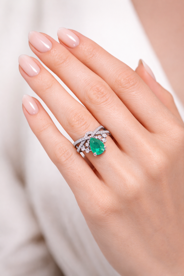 Pear-Cut Emerald Elegance Ring with Moissanite Accents in Silver
