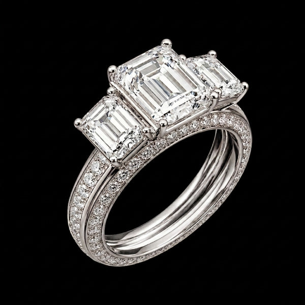 Elegant Three-Stone Emerald Cut Diamond Ring with Pavé Band in Two-Tone Gold