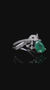 Pear-Cut Emerald Elegance Ring with Moissanite Accents in Silver